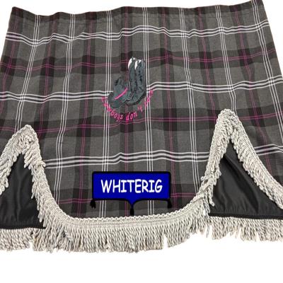 Deep back truck pelmet in grey check fabric, finished with silver-grey fringe trim and embroidered “Cowboys Don’t Care” detail. A bold and stylish upgrade for custom truck interiors. Whiterig Truck Curtains